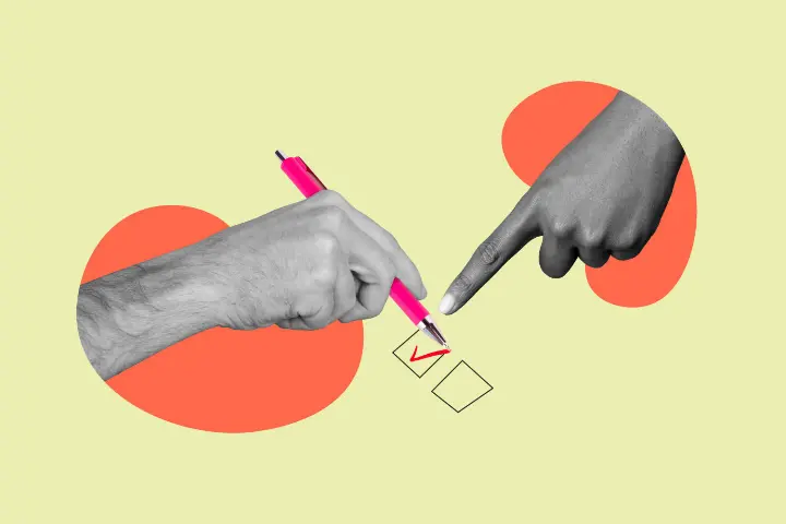 two hands, one checking a box